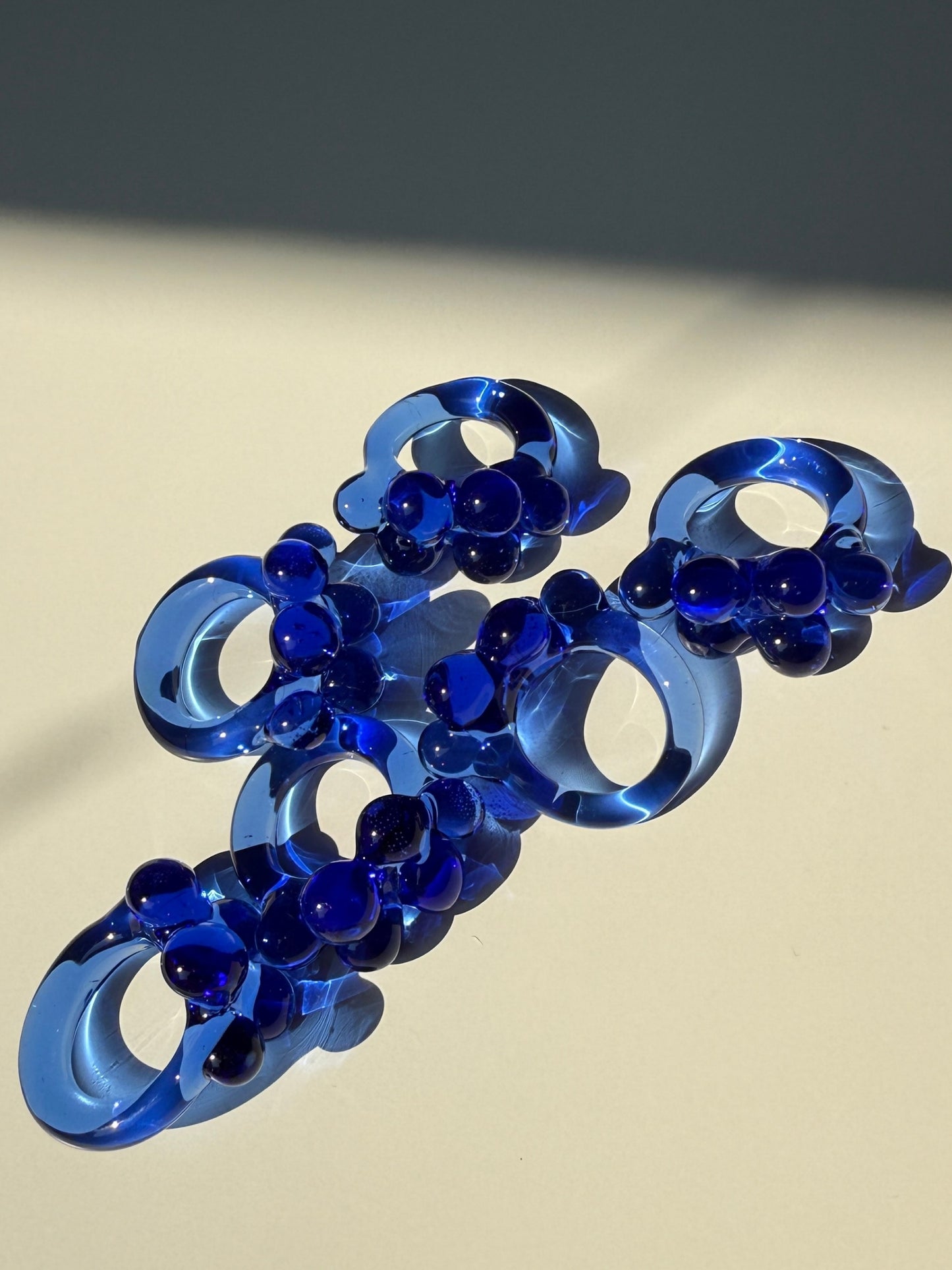 Close view of the handmade blue glass bubble ring by VOLD