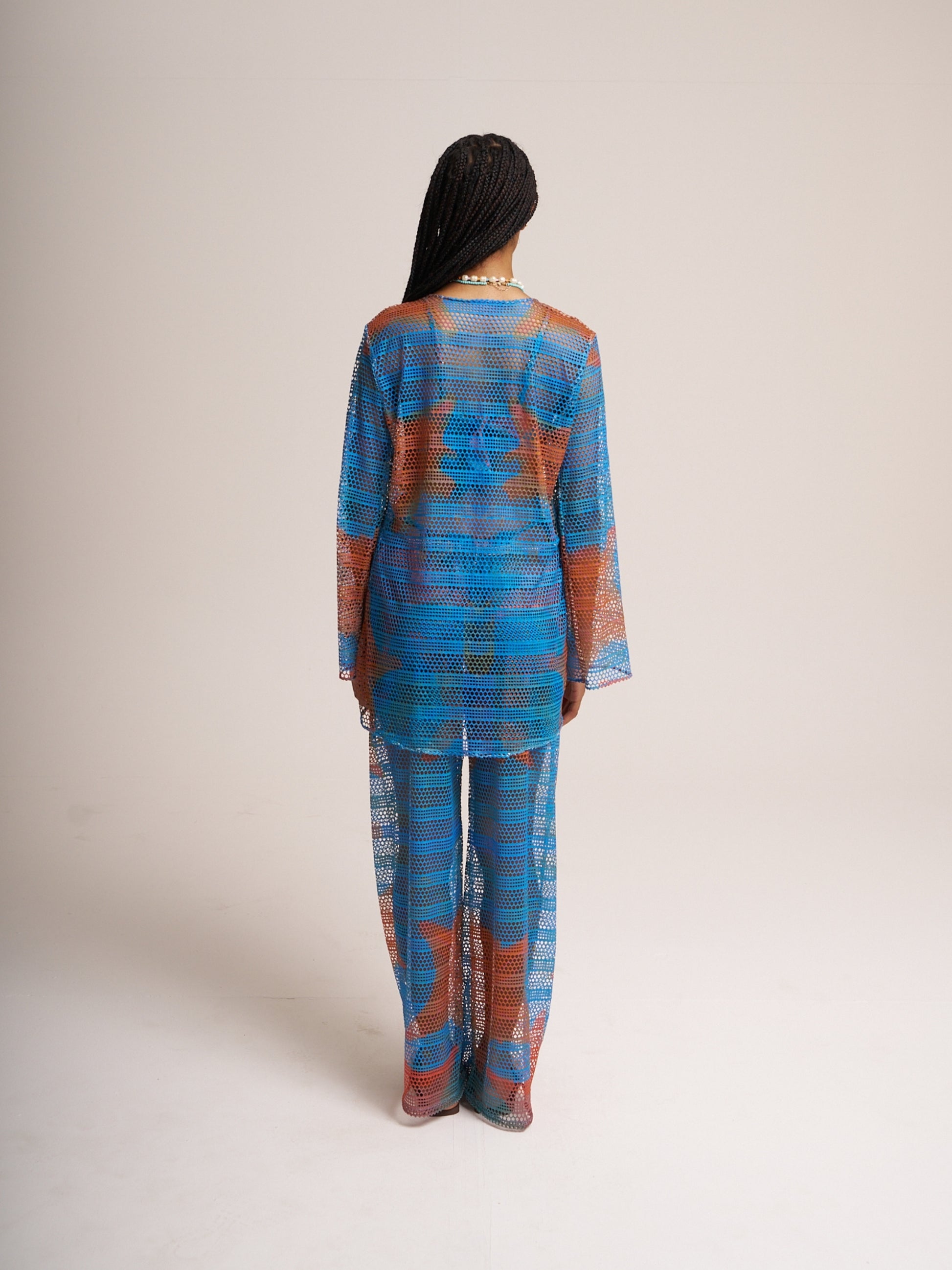 Back view of the blue Isla mesh set by Bahama Mama, studio shot