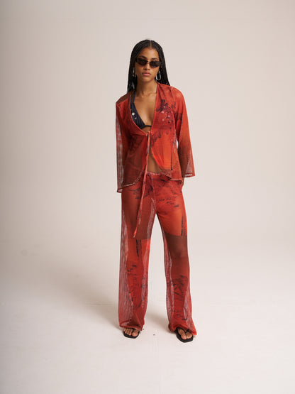 Isla Set by Bahama Mama in red, the mesh shirt worn open over a matching bikini