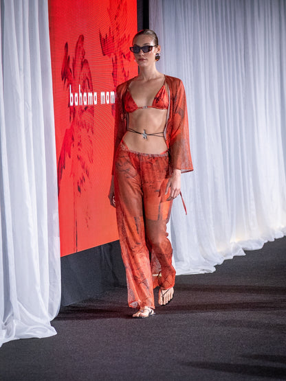 The red Isla mesh set by Bahama Mama on the runway at a brand presentation