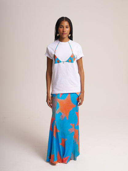 Surreal T-shirt Tropicana by Bahama Mama worn with the blue and orange star-print maxi skirt