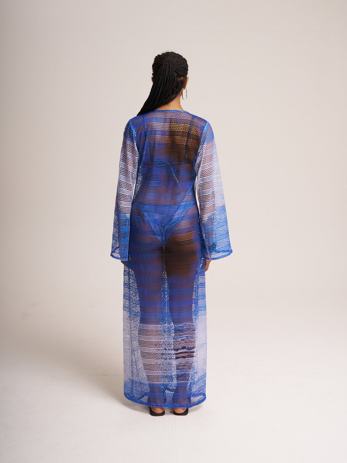 Back view of the long Titipan mesh cover-up by Bahama Mama, studio shot