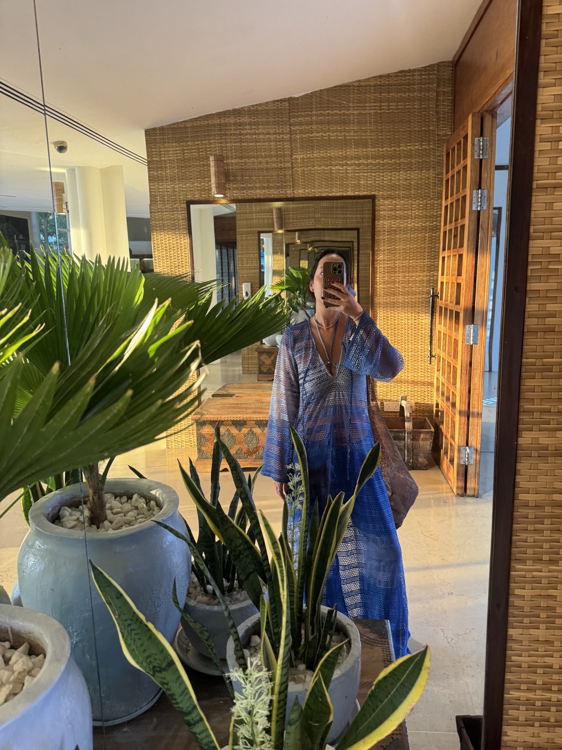Titipan Cover Up by Bahama Mama worn indoors among tropical plants