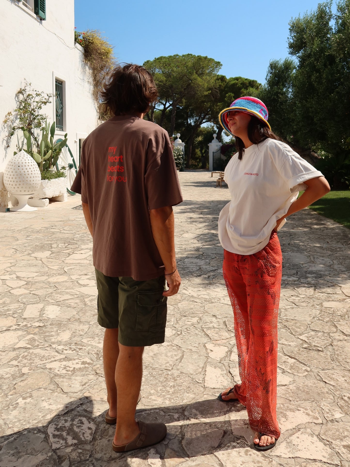 The Limited Edition CR T-shirt by Corazon Roto in Mocha and Cream, worn outdoors
