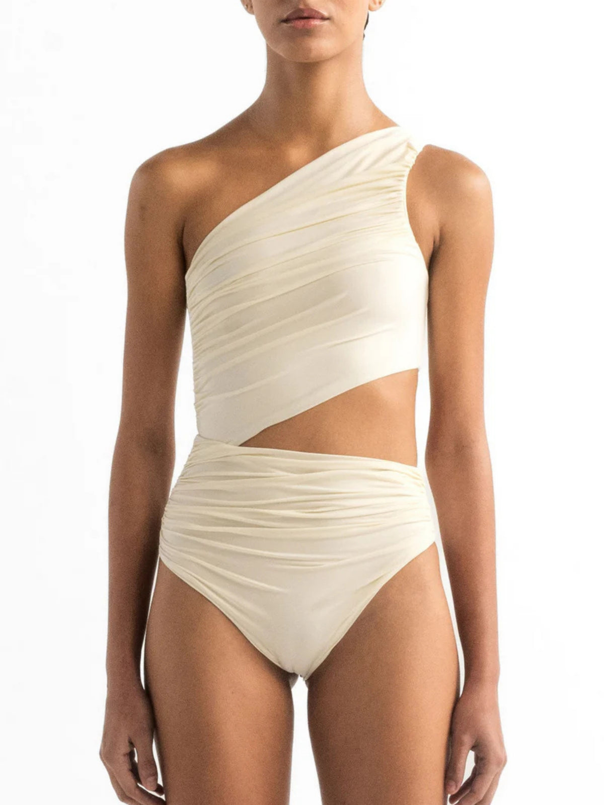 Diana Ivory swimsuit by Encantadore: a matte ivory one-piece with a single shoulder and waist cut-out