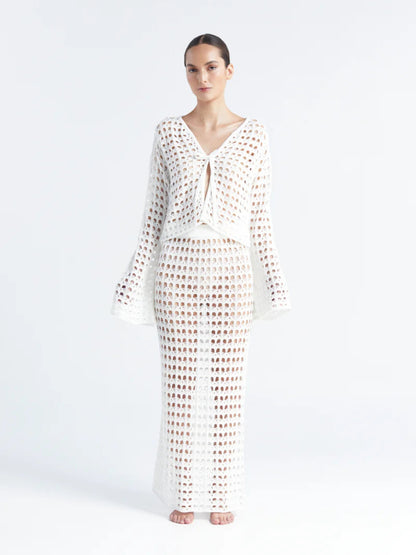 Studio view of the ivory crochet set by Encantadore: the Gio blouse and Siro wide-leg trousers