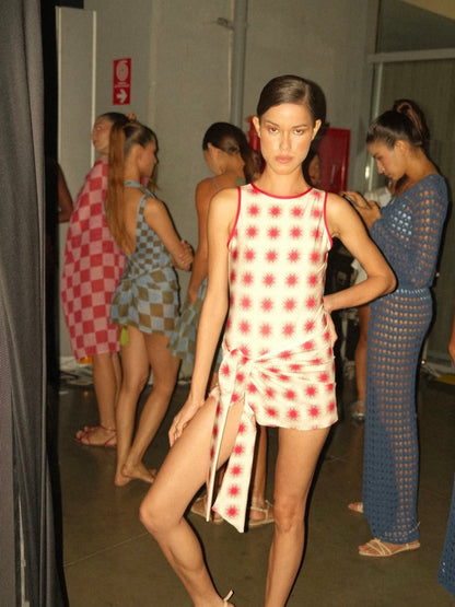 Encantadore Star Red pieces backstage before a runway show