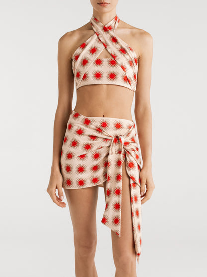 Saskia Star Red wrap skirt by Encantadore worn with the matching star-print halter top