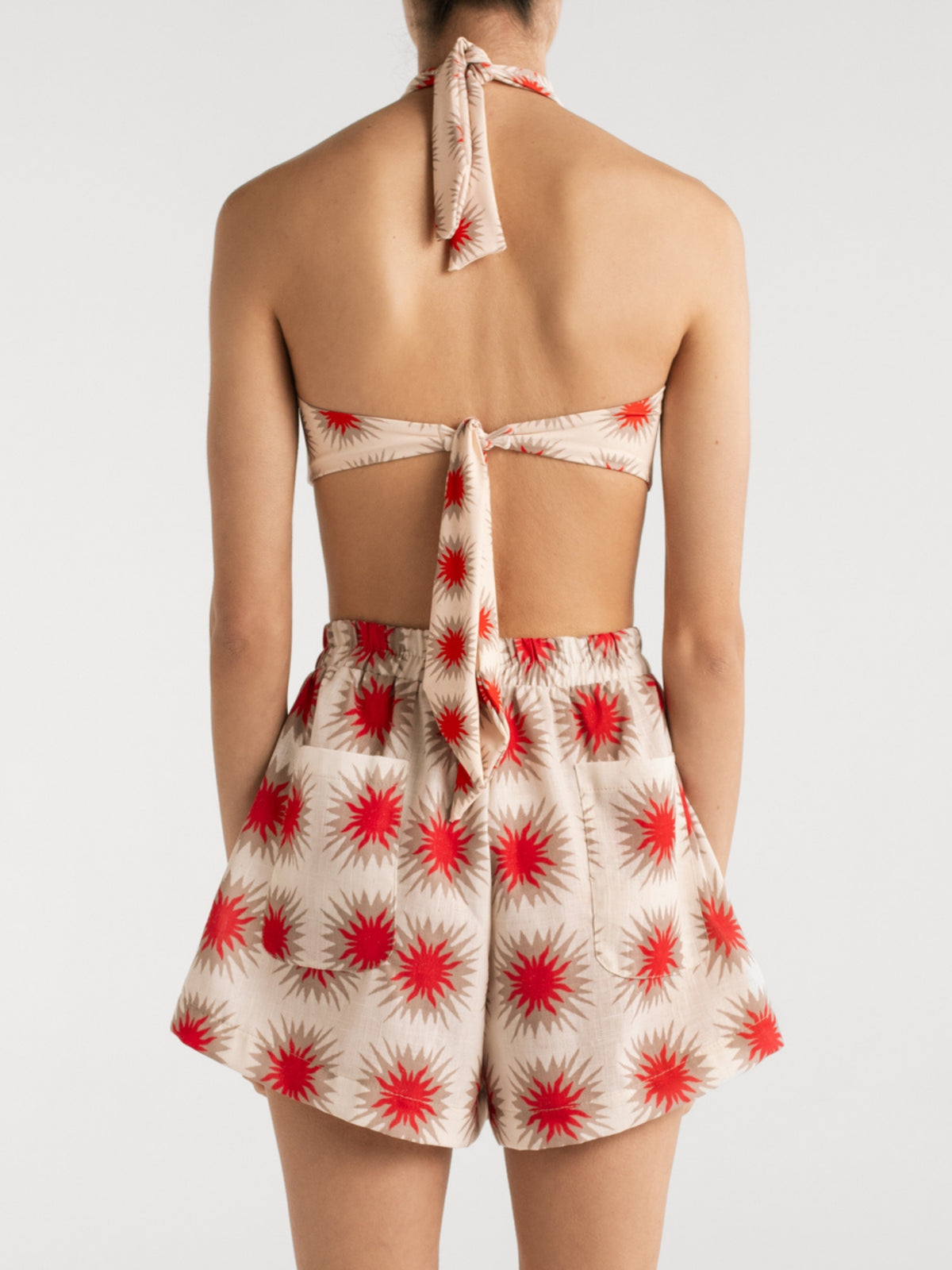 Back view of the Liana Star Red shorts and halter top by Encantadore