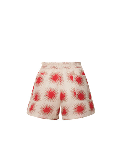 Liana Star Red Shorts by Encantadore: loose cotton shorts with a red starburst print on cream