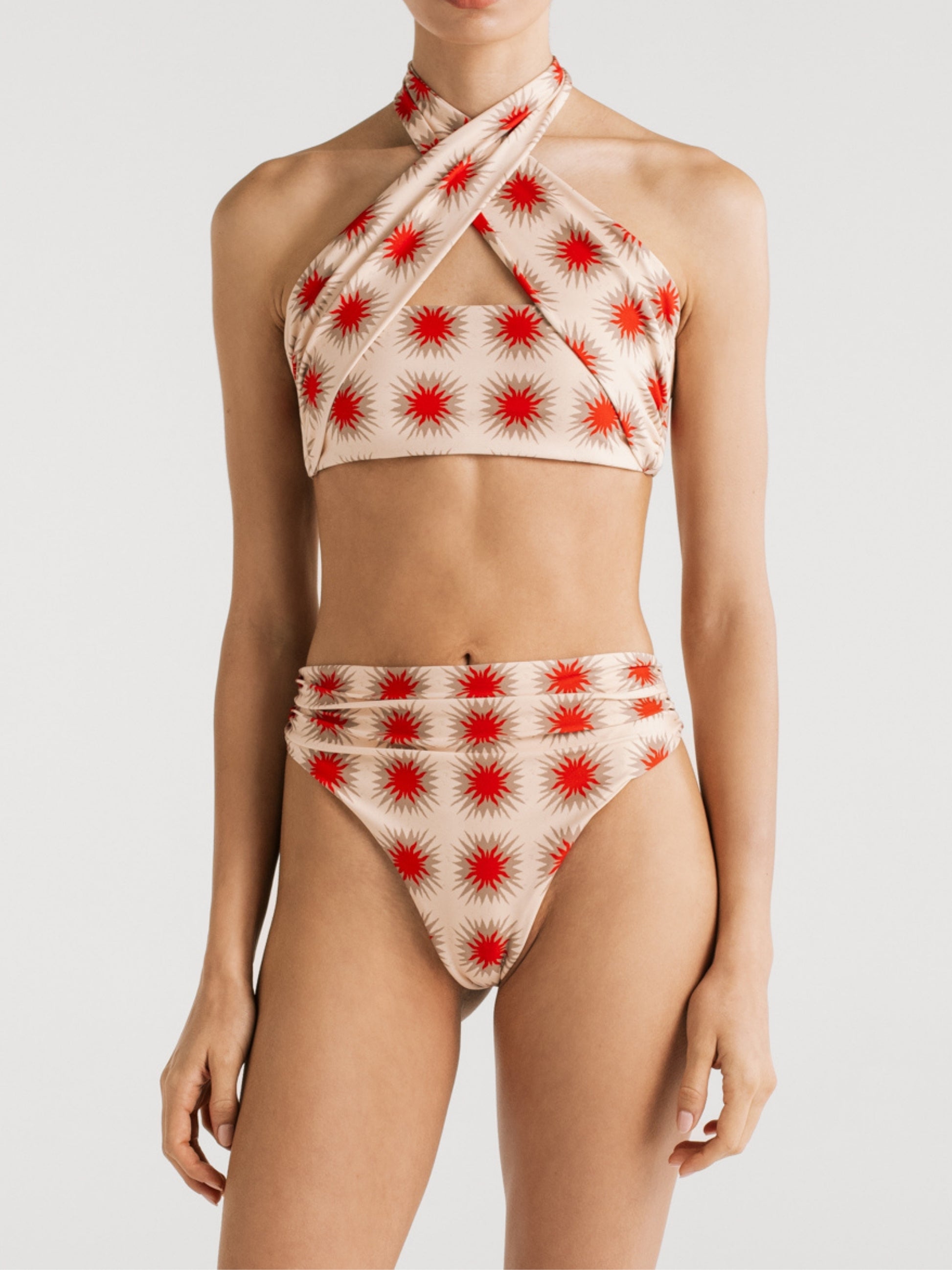 Esther Star Red high-waisted bikini bottom worn with the Paola cross-neck top by Encantadore
