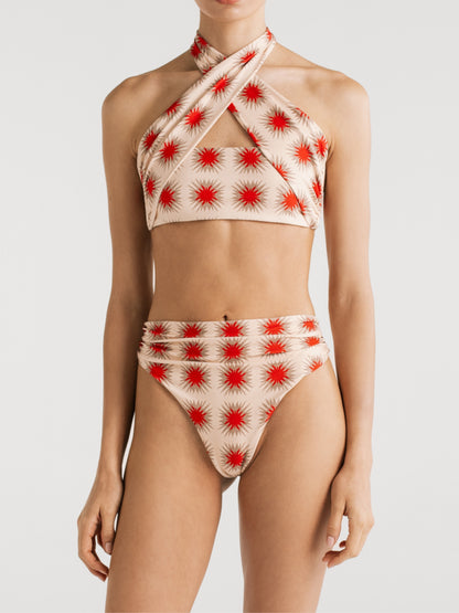 Esther Star Red high-waisted bikini bottom worn with the Paola cross-neck top by Encantadore