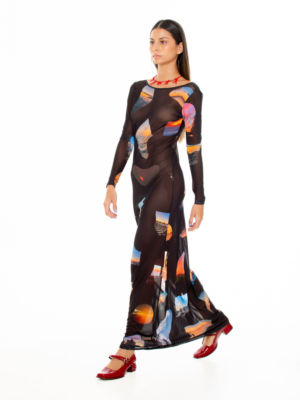 Three-quarter view of the Macondia Sunsets mesh dress worn with red shoes