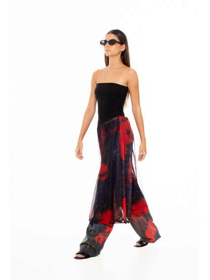 Macondia Red Roses sundress in motion, showing the printed sheer skirt