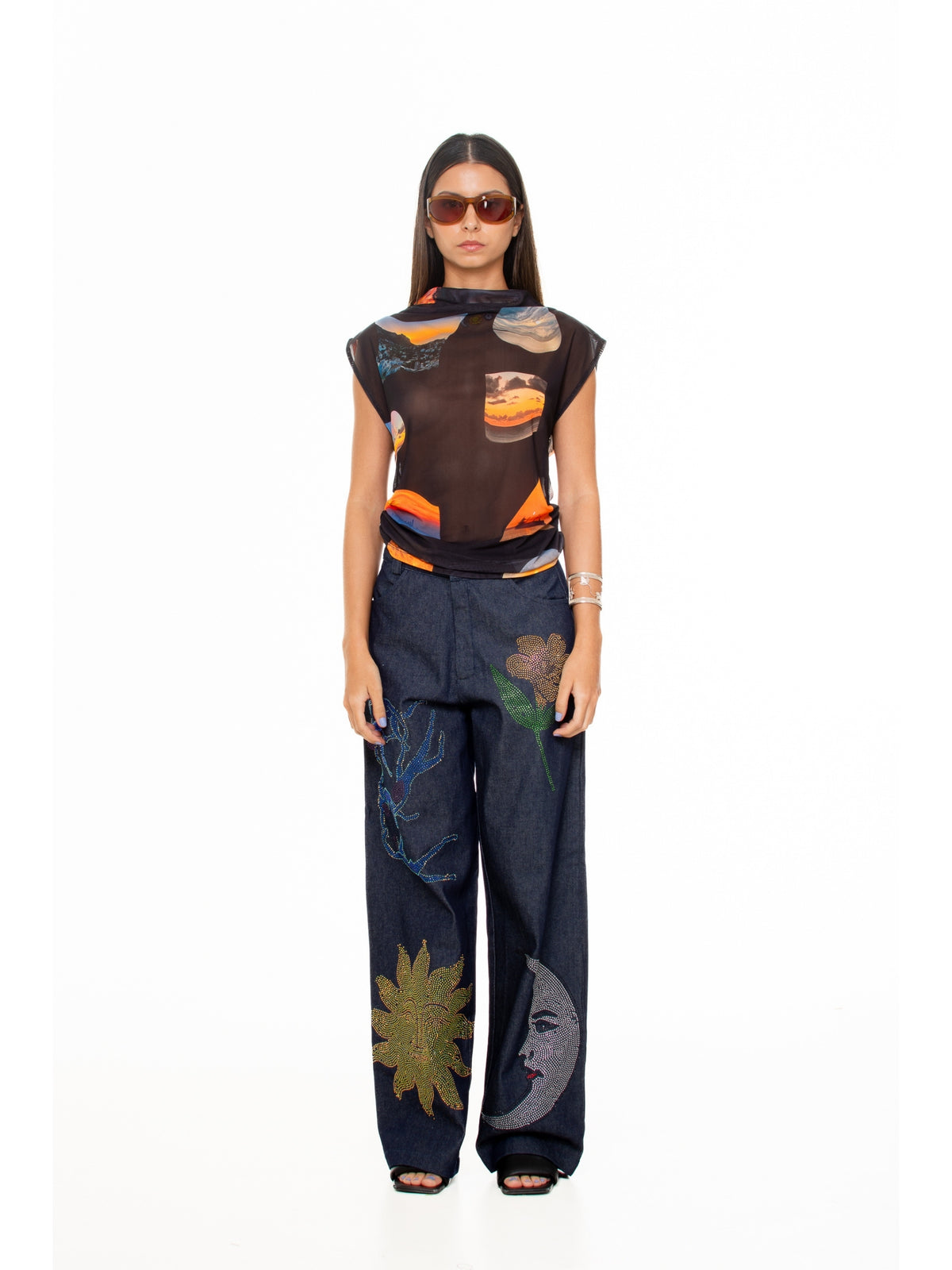 Studio view of the Macondia Sunsets printed funnel neck top
