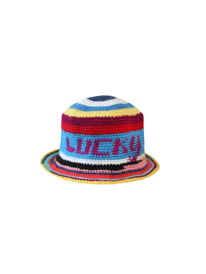 Side view of the Lucky Me crochet bucket hat by PÁJARA PINTA showing the LUCKY lettering