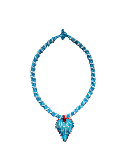 Short Lucky Me Necklace by PÁJARA PINTA: a light blue beaded heart on a short beaded strand