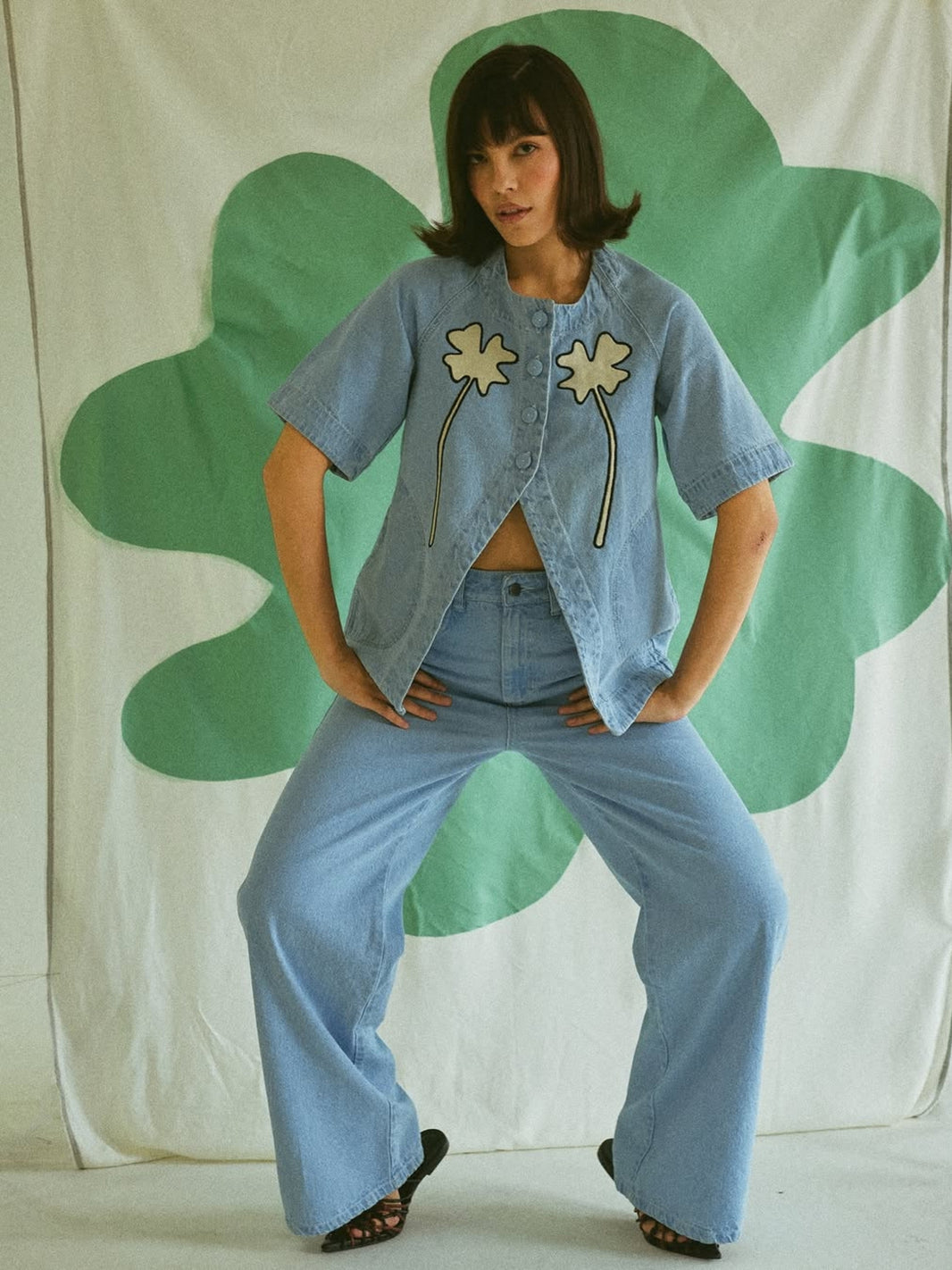 Clover Fortune Top White by SIXXTA: a light denim short-sleeve top with white clover appliques