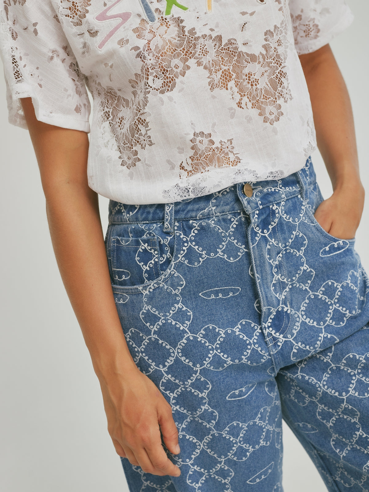 Close view of the printed motif on the SIXXTA Panes denim