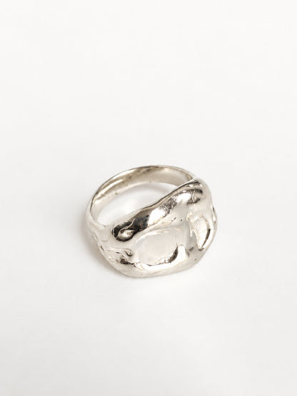 Chunky Ring by STUDIO MUREA: a wide 950 silver band with a rippled, organic surface, on a white background