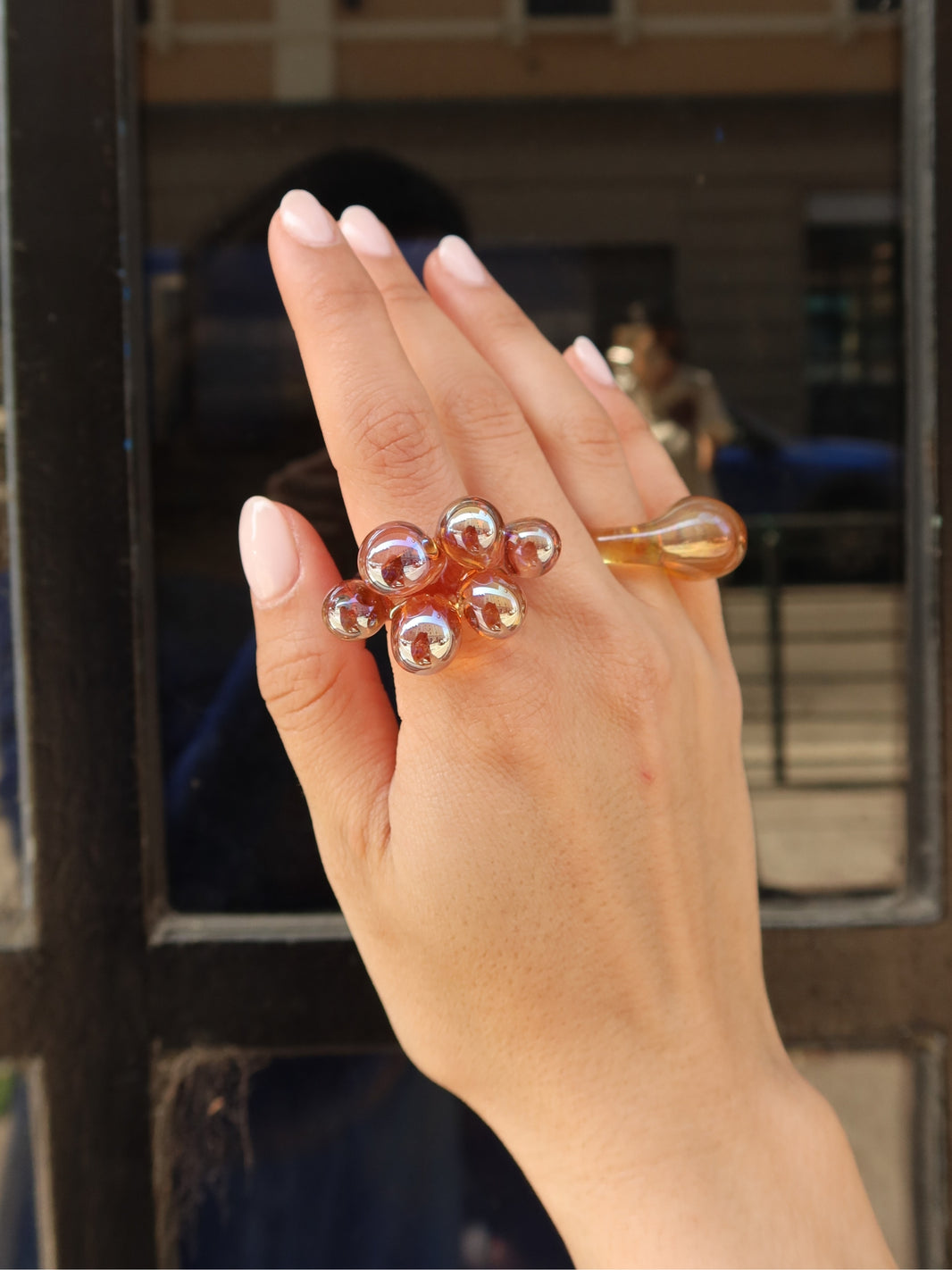 Fucking Bubbles Purple Ring by VOLD: a handmade purple glass bubble ring worn on a hand