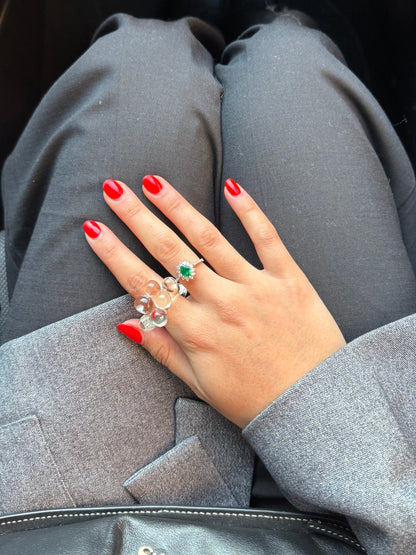 VOLD Bubbles Transparent glass ring worn with grey tailored trousers