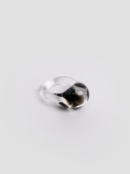Dalmatian Ring by VOLD: a clear glass band with a black and white spotted pattern