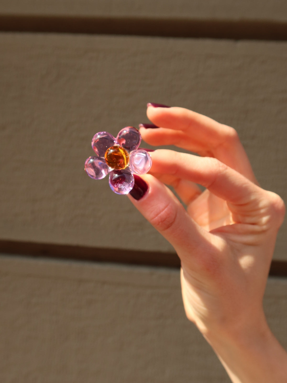 Florecita Ring by VOLD worn with red nail polish