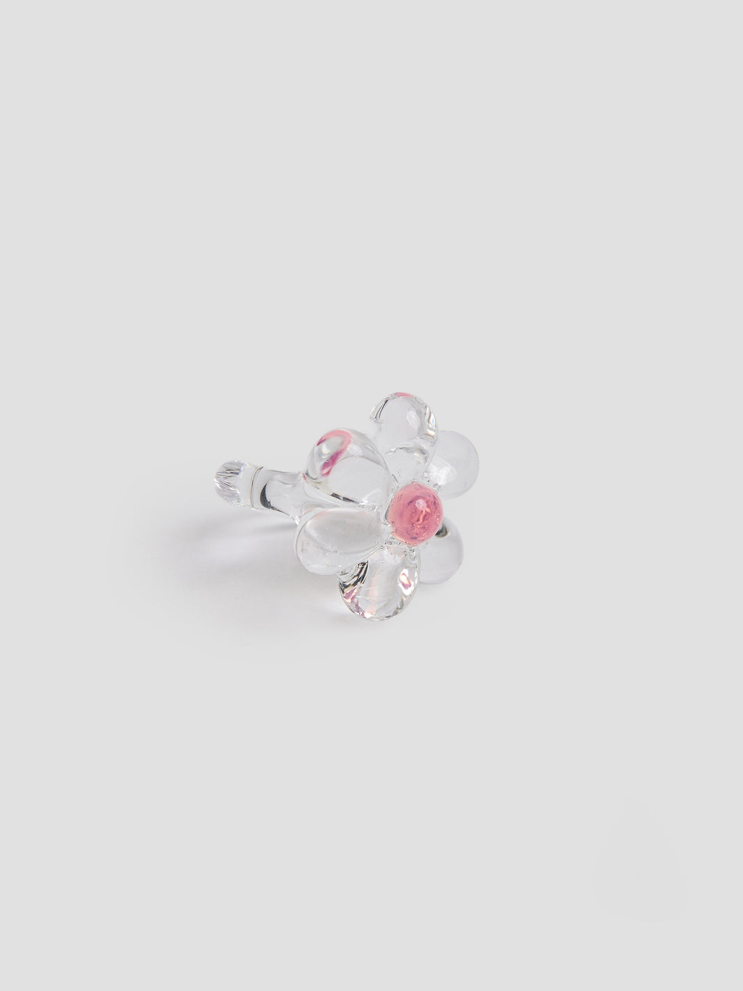 Ice Flower Pinky Ring by VOLD: a clear glass flower with a soft pink centre